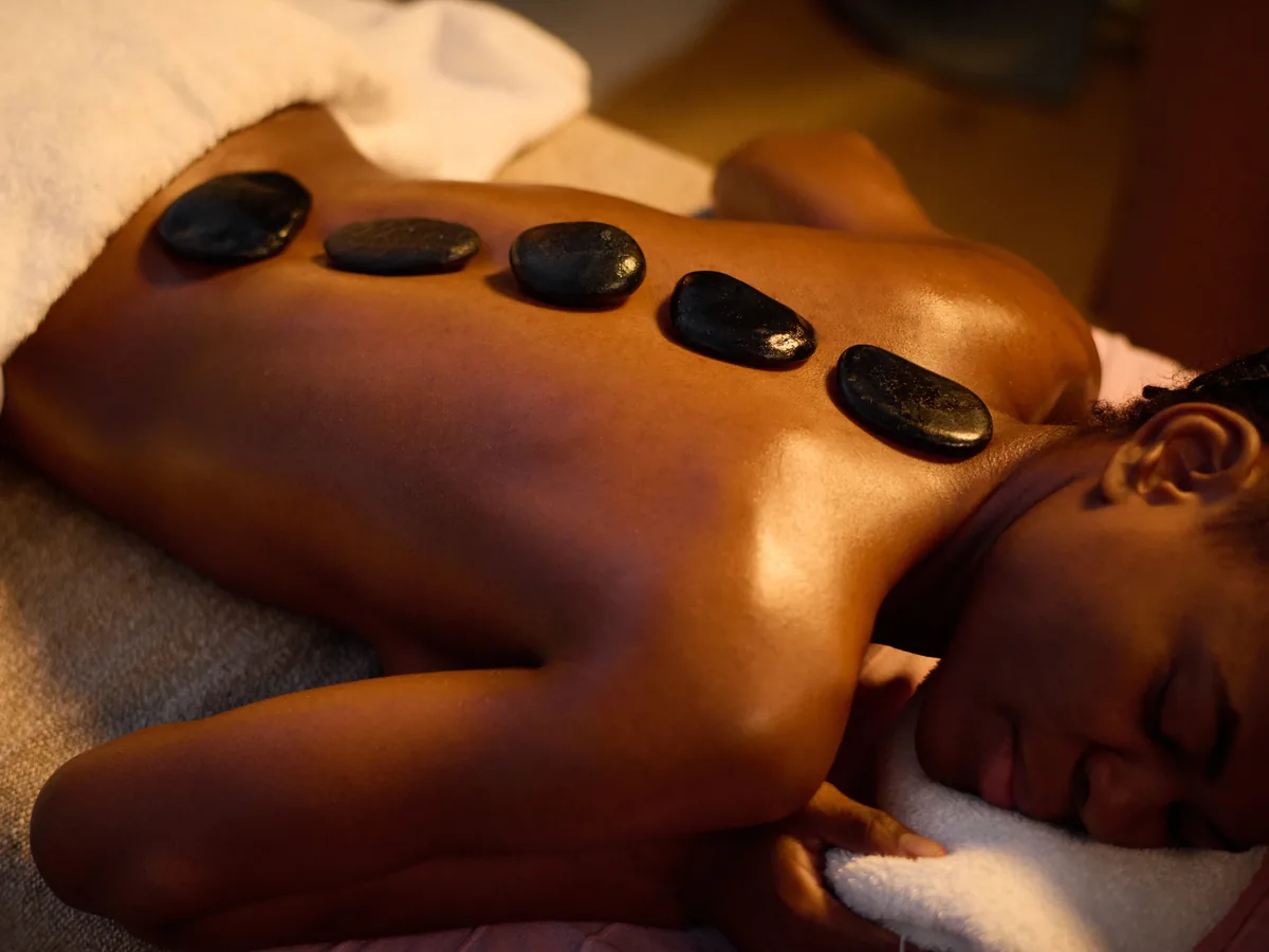 Hot Stones during a massage session
